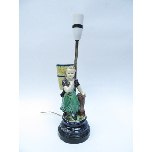 6030 - A 19th Century majolica figure turned into a table lamp