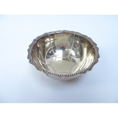 6385 - A William Hutton & Sons Ltd silver beaded bowl, Birmingham 1907, 10.5cm diameter, 100g and silver pe... 