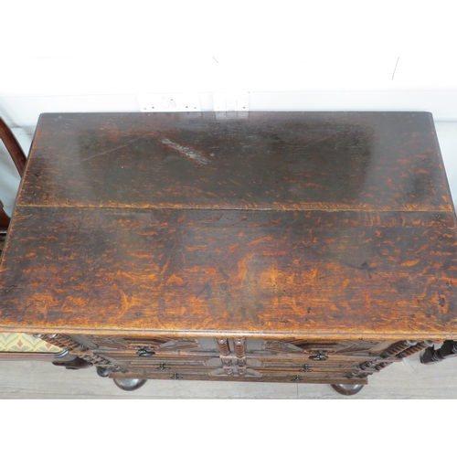 6037 - An 19th Century oak Jacobean style chest of three drawers on bun feet, 91cm x 95cm x 53cm