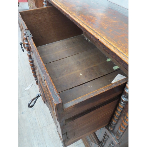 6037 - An 19th Century oak Jacobean style chest of three drawers on bun feet, 91cm x 95cm x 53cm