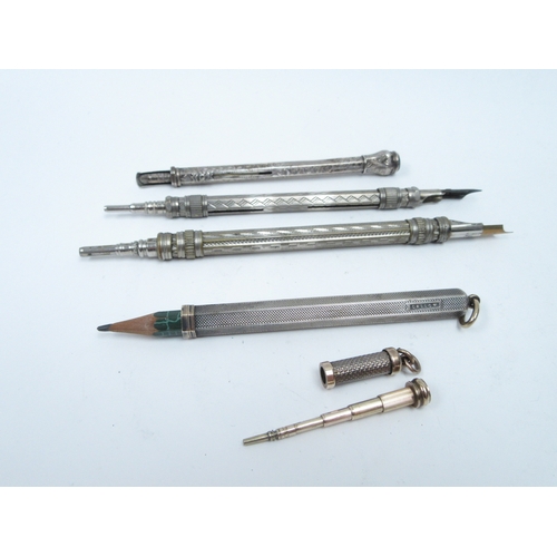 6357 - Eight propelling pencils including double ended with quills, etc