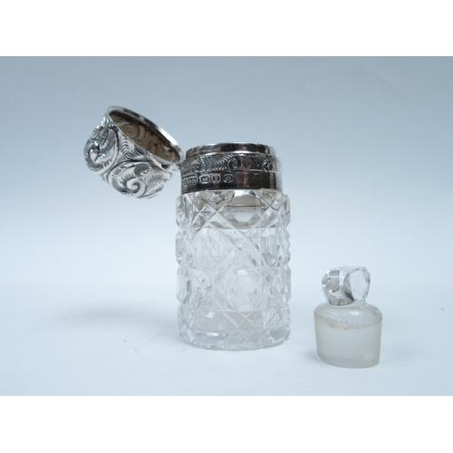 6407 - An M Bros silver topped scent bottle Birmingham 1898, silver coloured scent bottle and Ari D Norman ... 