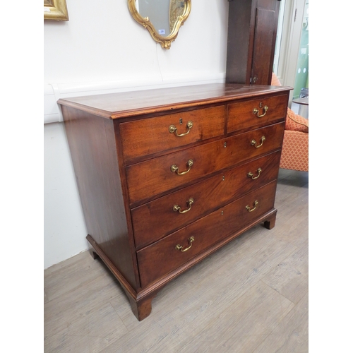 6063 - Probably Scottish, a George III flame mahogany chest of two short over three graduating long drawers... 