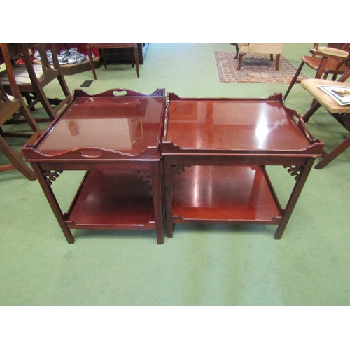 4035 - A pair of George III mahogany style butler's tables the lift-off tray with fret handles and glass in... 