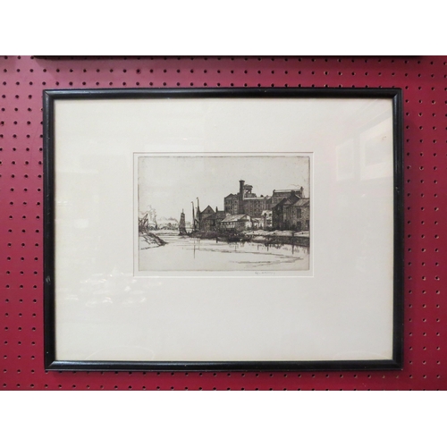 4040 - EDGAR HOLLOWAY (1914-2008): A framed and glazed etching, canal boats beside industrial buildings.  P... 