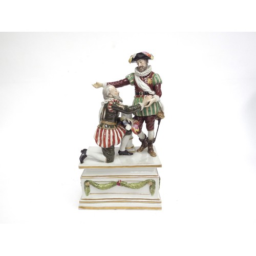 4340 - A late 19th Century Continental porcelain figural group as two thespians in striped pantaloons, one ... 