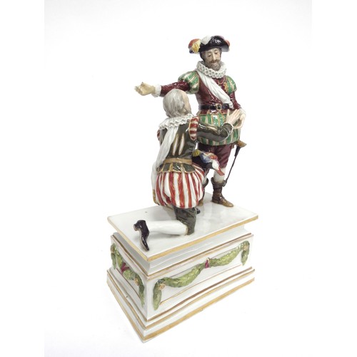 4340 - A late 19th Century Continental porcelain figural group as two thespians in striped pantaloons, one ... 