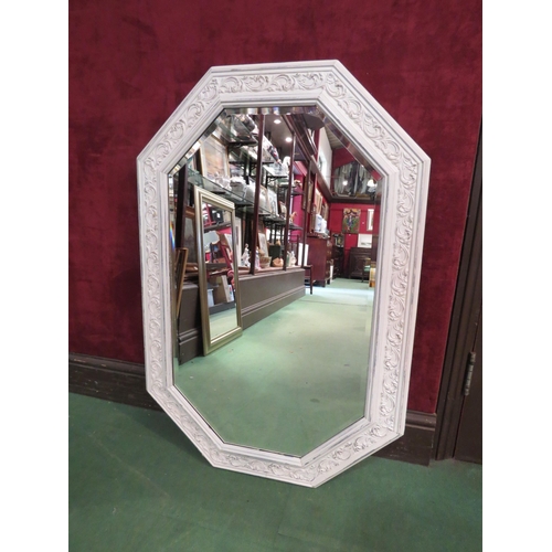 4251 - A cream painted bevel edged wall mirror, 92cm x 61cm wide