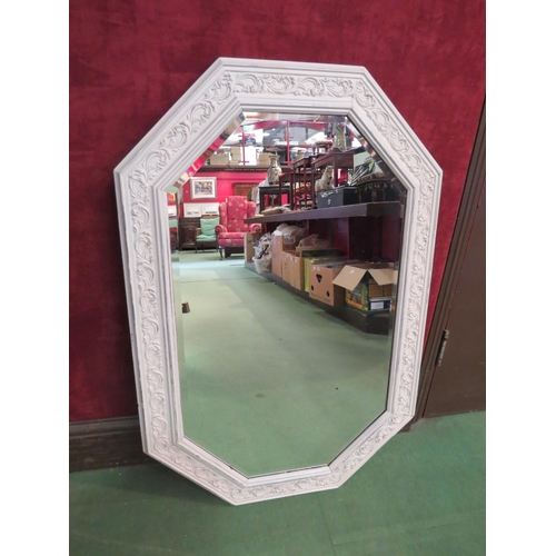 4251 - A cream painted bevel edged wall mirror, 92cm x 61cm wide