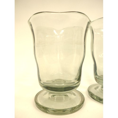 7292 - A pair of Swedish clear glass pedestal vases c1940's, possibly by Stomberg. 20cm high (Watermarked)