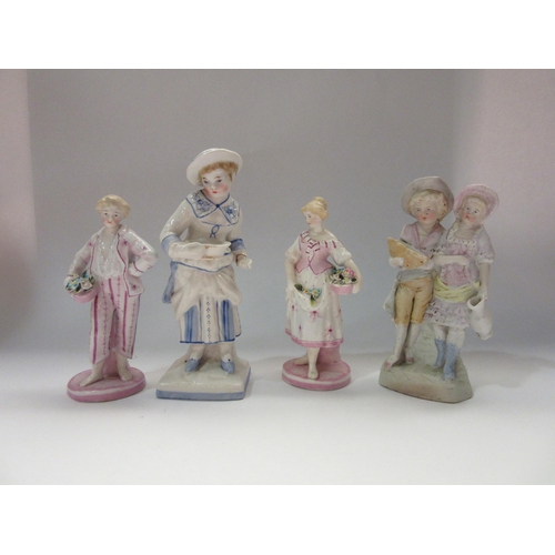 4310 - Four Continental ceramic figures, two holding a basket of flowers