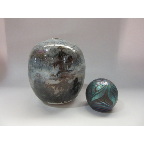 4311 - A studio pottery vase with design of pine trees, together with an Okra iridescent glass paperweight,... 