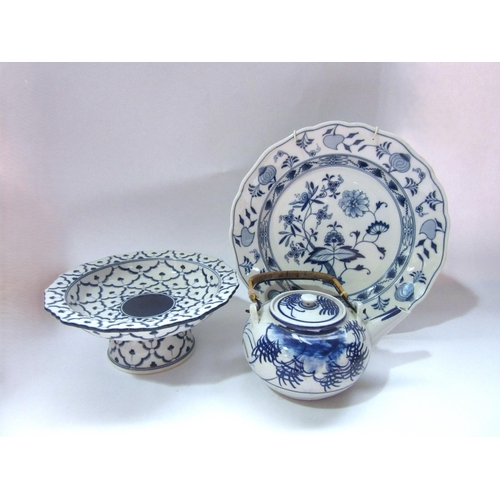 4319 - Three blue and white ceramics including a Meissen plate, Thai comport bowl and Japanese teapot