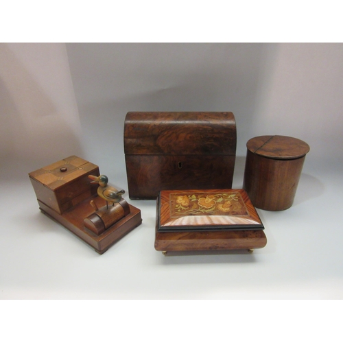 4368 - A group of wooden items including cigarette dispenser, music box, tea caddy and lidded pot.