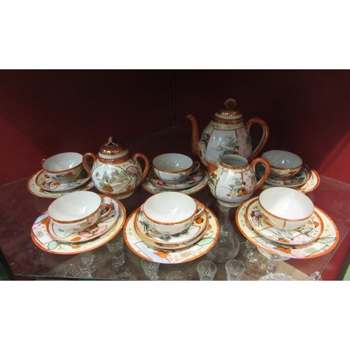 4384 - A Japanese eggshell tea set for six, including teapot, jug, cups, etc.