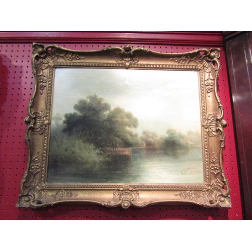 4065 - W. HARDING: An oil on canvas of a quayside with woodland to background.  Signed lower right.  Gilt f... 