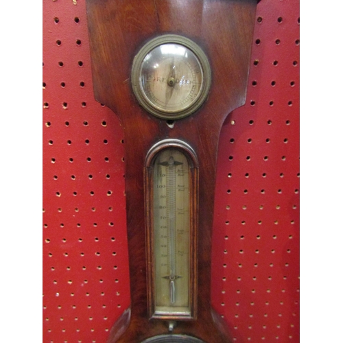 4121 - An early 19th Century Scottish mahogany wheel barometer in a banjo shaped case, with broken swan-nec... 