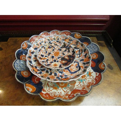 4072 - Seven assorted Japanese Imari dishes, largest 31cm diameter