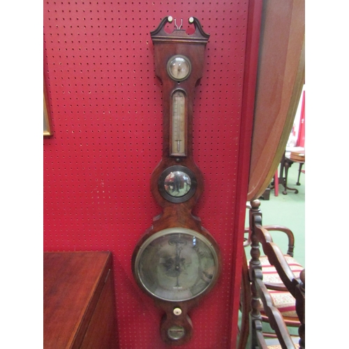 4121 - An early 19th Century Scottish mahogany wheel barometer in a banjo shaped case, with broken swan-nec... 