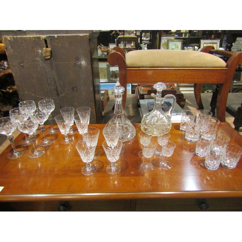 4260 - A cut glass ship's decanter, one other, and a selection of glasses including six Stuart hock, four l... 