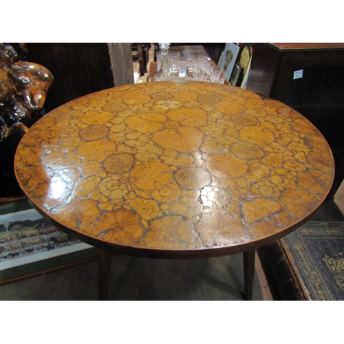 4269 - A circular top occasional table with crosscut end grain decoration over tapered legs, 40cm tall x 58... 