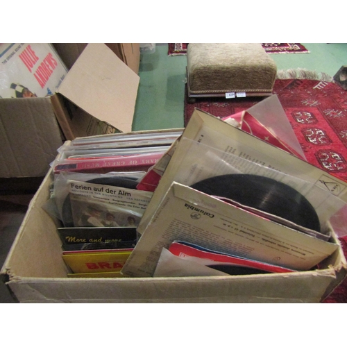 4294 - Two boxes containing a collection of vinyl LP records and 7