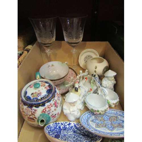 4301 - A pair of wine glasses and decorative ceramics including Victorian fairings and Japanese cup and sau... 