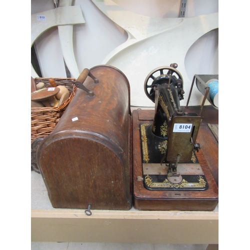 2473 - A dome cased Singer sewing machine