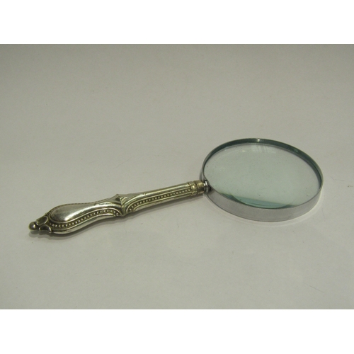 4416 - A United Nations New York letter opener and a magnifying glass with silver plated handle (2)