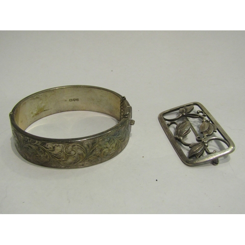 4432 - A silver bangle marked Chester 1955 and a Danish white metal brooch marked Sterling 925