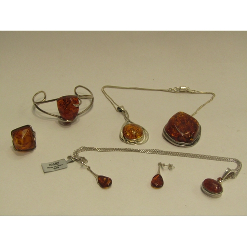 4442 - Assorted amber jewellery including bangle, pendants on chains, earrings etc