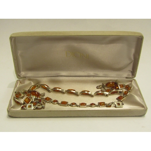 4446 - An amber necklace and amber bracelet, both marked 825 in Dicini box