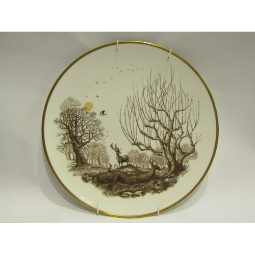 4470 - Three decorative wall hanging plates, two matching