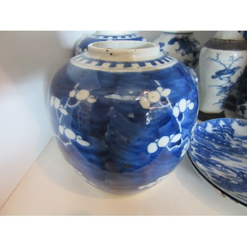 1505 - A selection of Oriental blue and white ceramics, various dates, including a pair of prunus pattern g... 