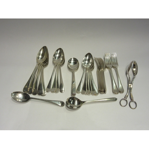 4389 - A quantity of plated cutlery including spoons, forks, knives and a salad server, some being Mappin &... 