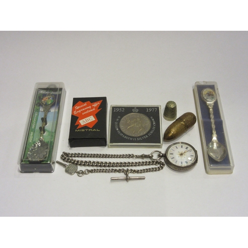 4395 - A fob watch on silver chain, Zippo lighter, silver thimble, two commemorative spoons, silver jubilee... 