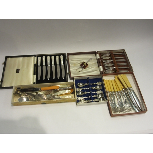 4397 - A selection of cased and loose cutlery including cake knives