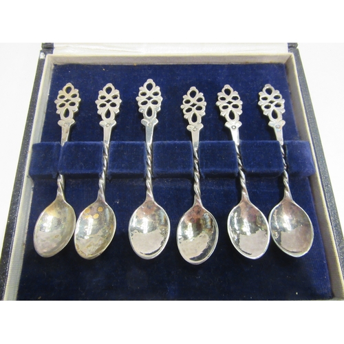 4398 - A Frances Harling cased set of six silver hammered coffee spoons with pierced finials