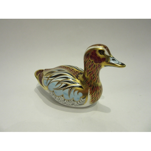 4410 - A Royal Crown Derby Collectors Guild Duck paperweight, gold stopper, 9cm tall