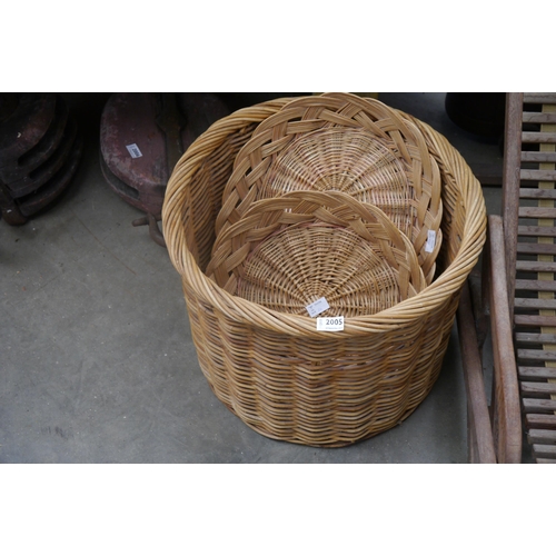 2005 - A large wicker log basket and two shallow baskets