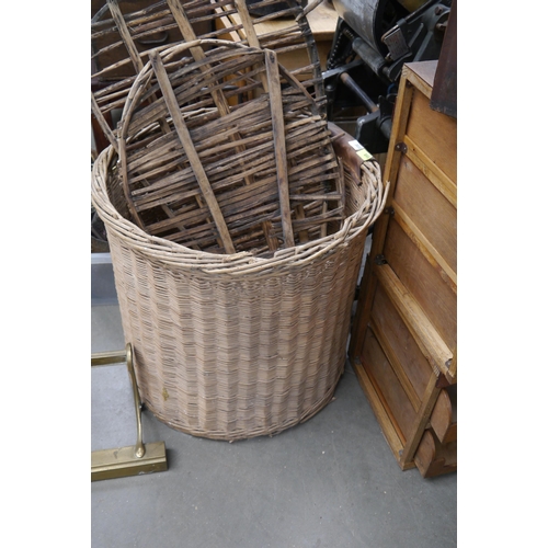 2030 - A large circular wicker log basket