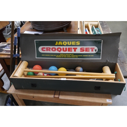 2064 - A cased Jaques croquet set