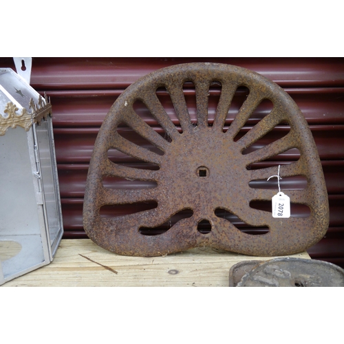 2078 - A cast iron implement seat