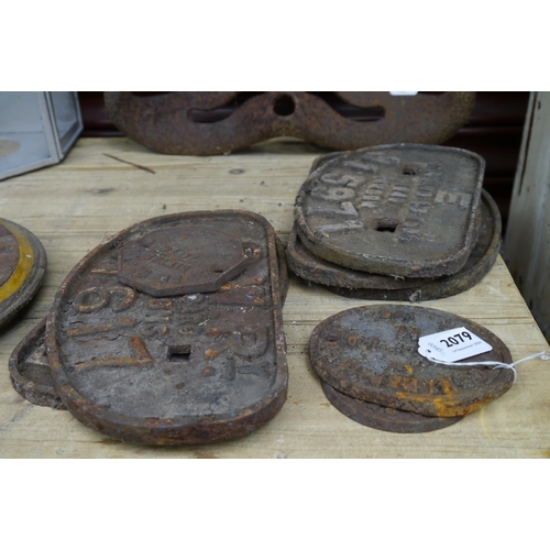 2079 - A collection of cast iron wagon plates