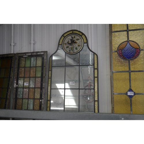 2100 - A Victorian stained glass mirror, one panel cracked with bird to top