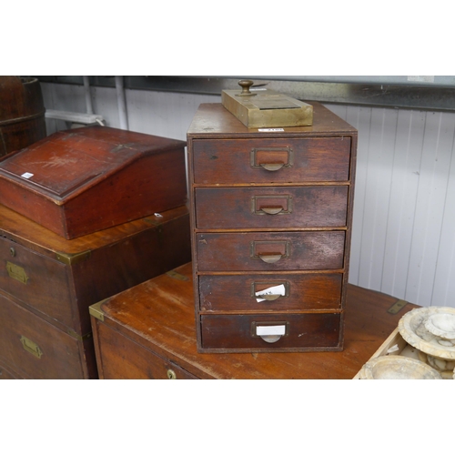 2106 - A pine/mahogany desk top filing cabinet of five drawers