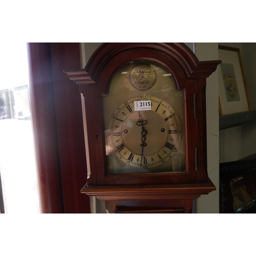 2115 - A mahogany grand-mother clock with key weights and pendulum