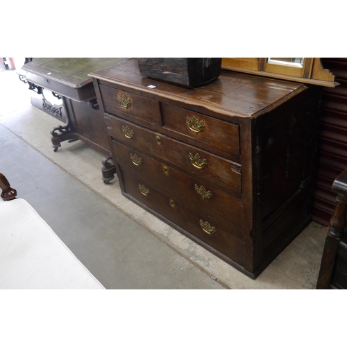 2124 - A Jacobean oak two over three chest of drawers, bottom drawer fixed shut