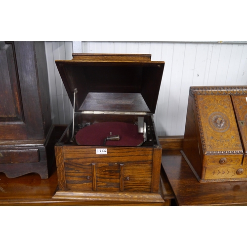 2132 - A 1930's oak cased table top gramophone