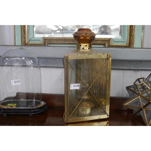 2138 - A Victorian brass and copper triangular carriage lamp